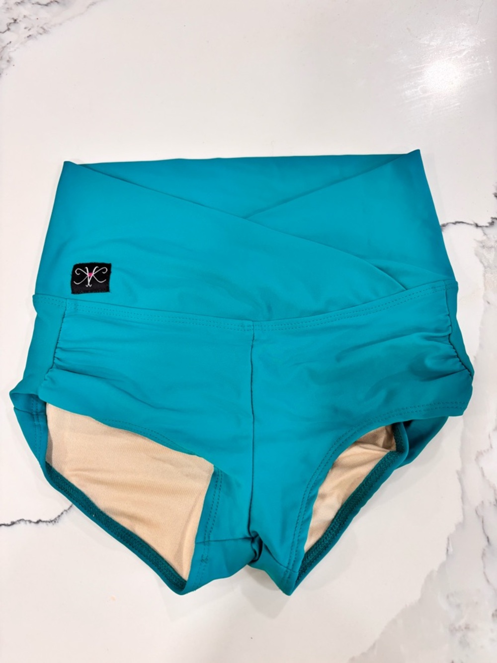 High-Waist Turquoise Swim Shorts with Crossover Waistband